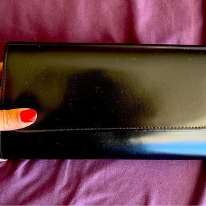 Smooth, black, Italian clutch
